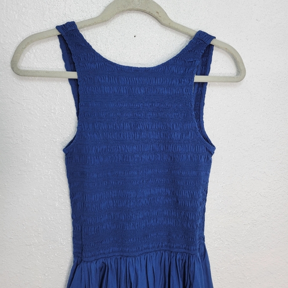 the melody scoopback smocked midi dress The Melody Scoopback Smocked Midi Dress